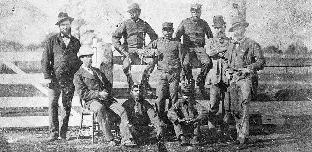 Aboriginal Mounted Police, usually described as ‘blacktrackers’, pose at Benalla with, from left, Senior Constable King, Stanhope O’Connor, Superintendent Sadleir and Chief Commissioner Standish. The Aboriginal troopers were the only police pursuers Ned truly feared, referring to them as ‘six little demons’. Private collection Inset, Sub-Inspector Stanhope O’Connor of the Queensland police who led the party of Aboriginal Mounted Police. Image: Victoria Police Historical Unit